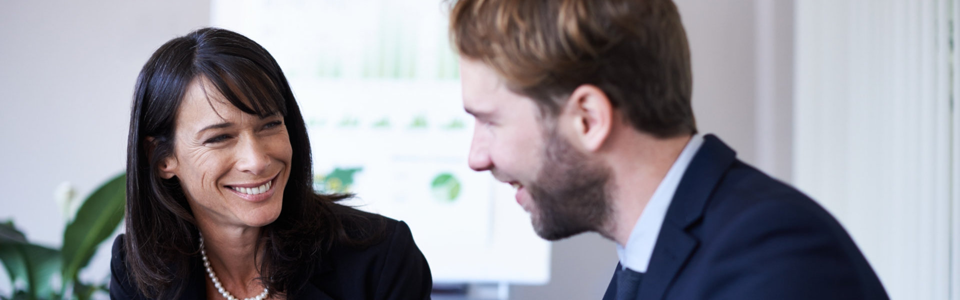 Two people smiling at each other