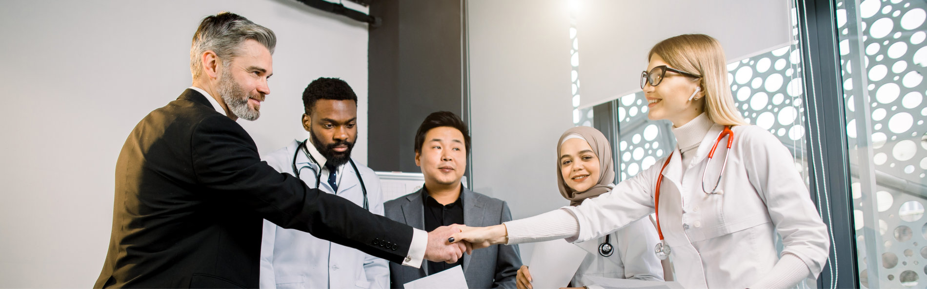 Team Of Doctors, Scientists, Pharmaceutical Workers Having Meeting In Modern Lab With Equipment